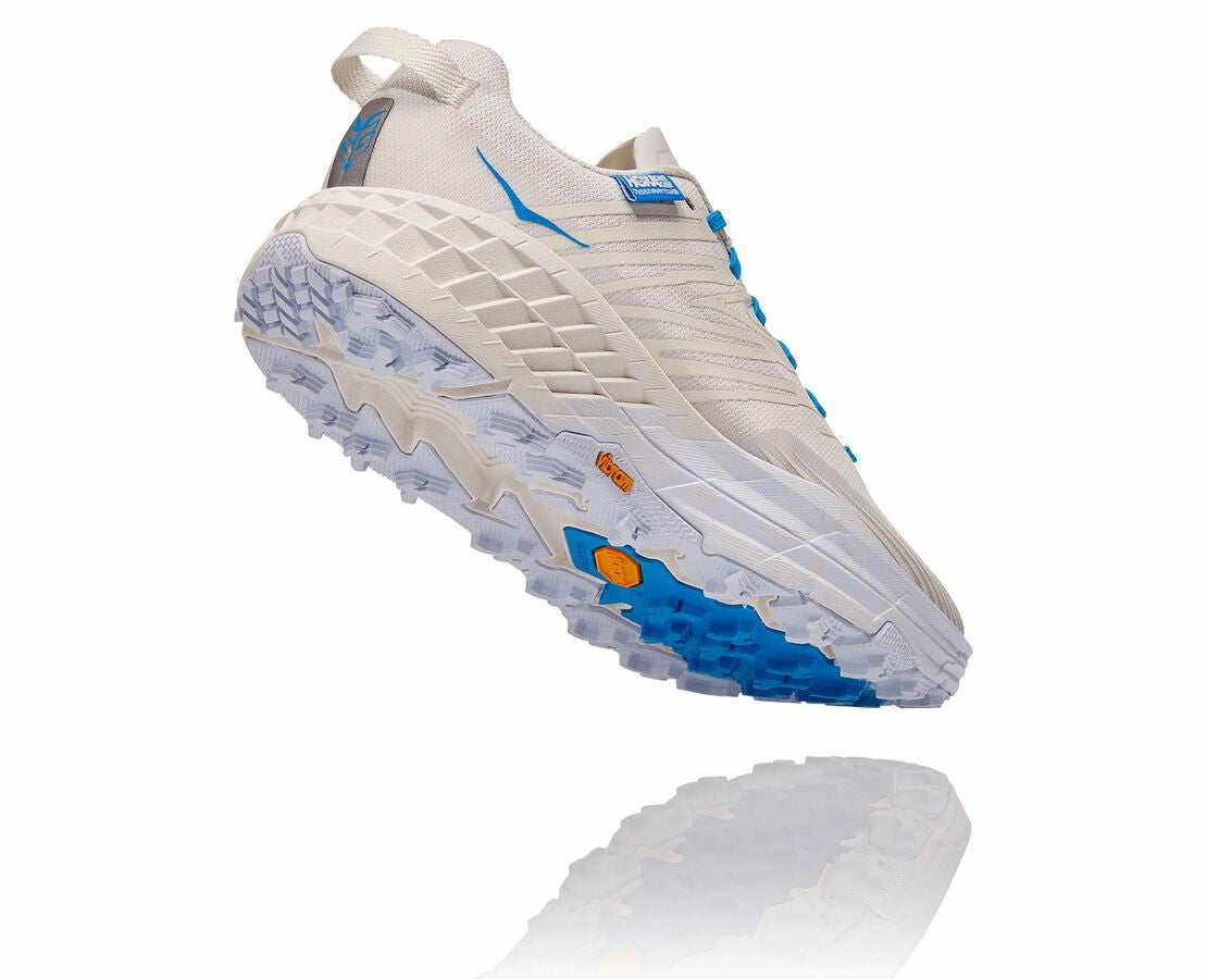 All Gender Hoka X Tint Speedgoat 4 Marshmallow / Cyan Blue