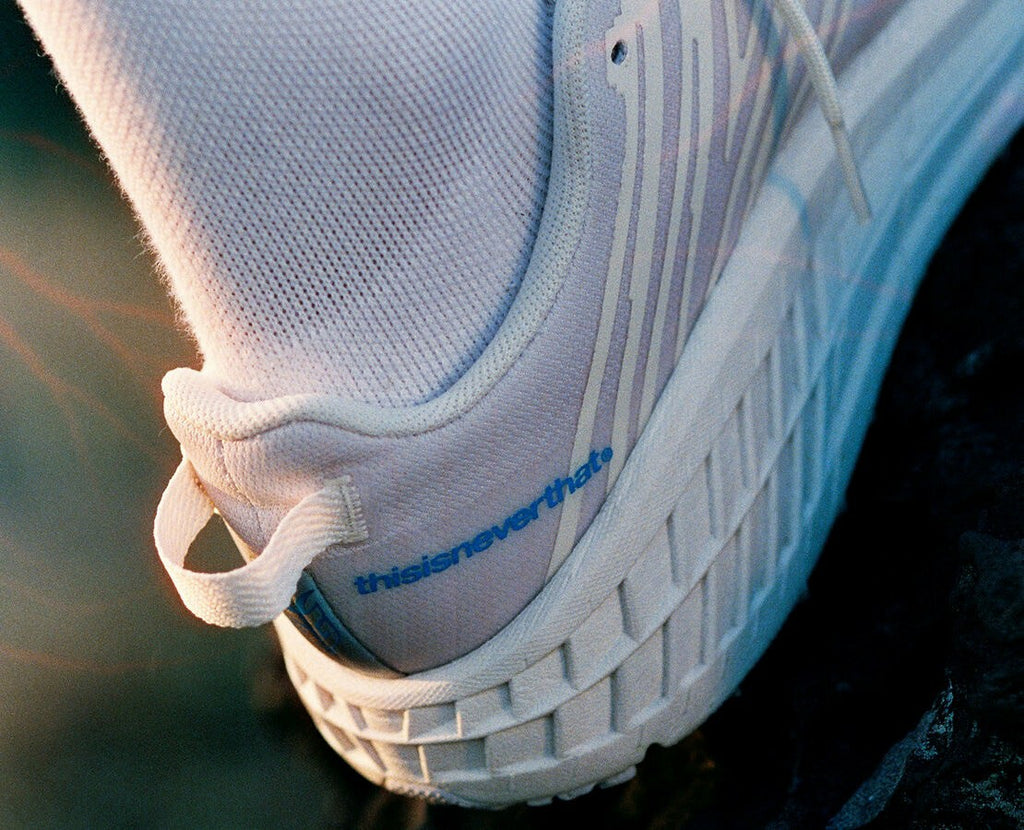 All Gender Hoka X Tint Speedgoat 4 Marshmallow / Cyan Blue